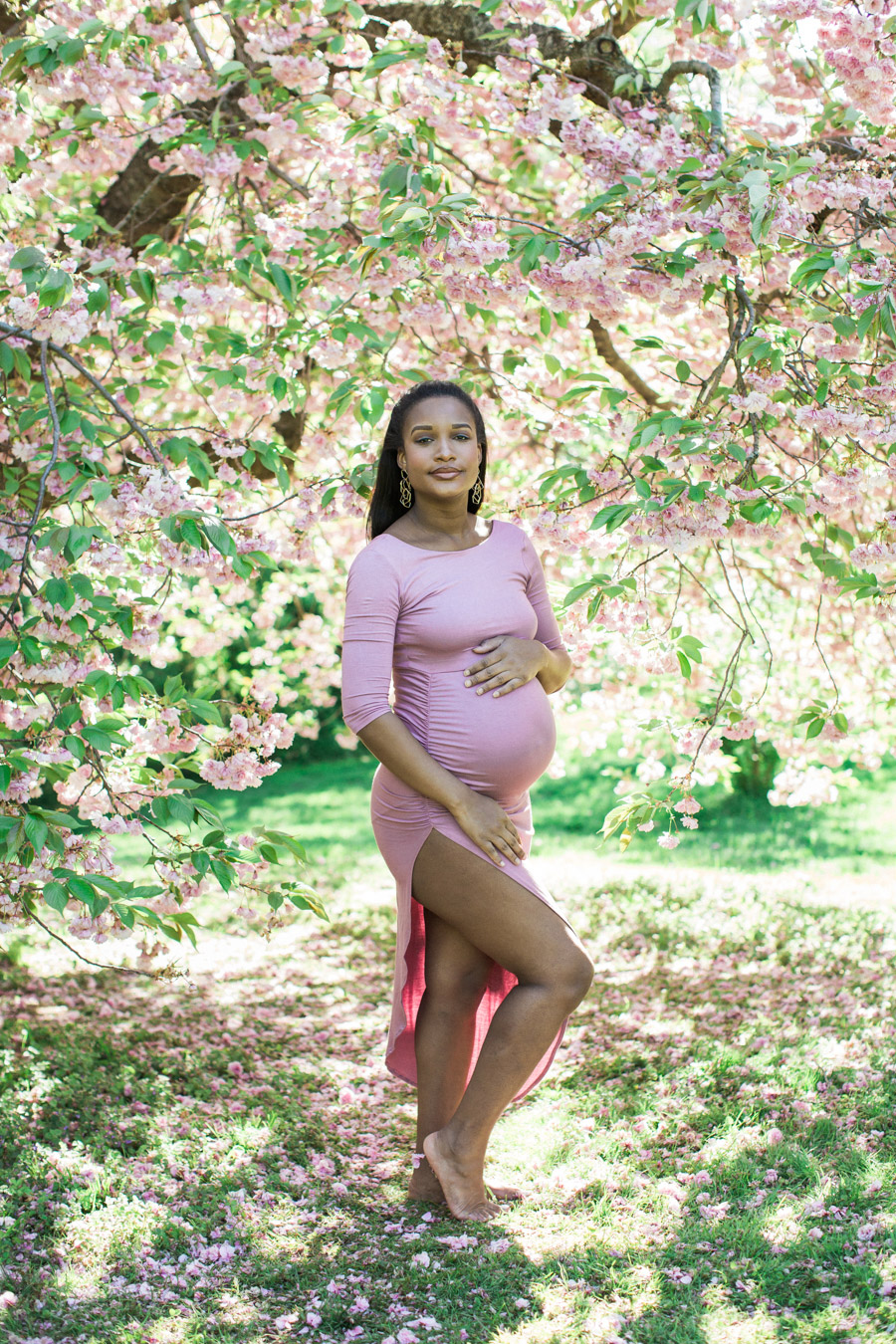 Maternity session in the New York Botanical Gardens cherry blossoms. Photos by Kelly Kollar Photography