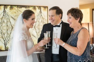 Rainy wedding at Church of St Francis Xavier in Manhattan, portraits in Washington Square Park and reception at Liberty House in Jersey City. Photos by Kelly Kollar Photography.