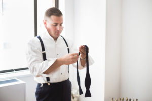 Rainy wedding at Church of St Francis Xavier in Manhattan, portraits in Washington Square Park and reception at Liberty House in Jersey City. Photos by Kelly Kollar Photography.