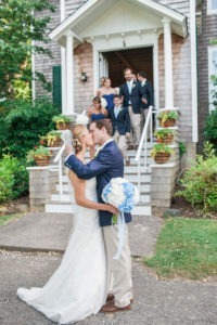 A bride and groom after their wedding ceremony on Shelter Island in New York. Photo by Kelly Kollar Photography.