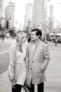 A black and white photo of an engaged couple in Manhattan's Flatiron neighborhood. Photo by Kelly Kollar Photography.