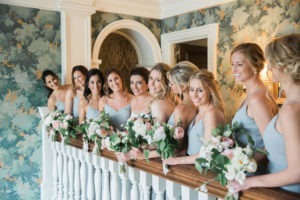A bride and her bridesmaids at a wedding at Hamilton Farm Golf Club in New Jersey. Photo by Kelly Kollar Photography.