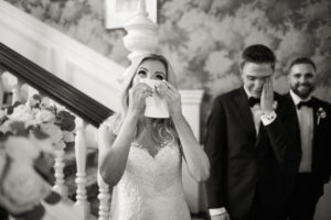 A black and white photos of a bride crying at her wedding at Hamilton Farm Golf Club in New Jersey. Photo by Kelly Kollar Photography.