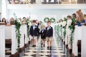 Ring bearers during a wedding ceremony in New Jersey. Photo by Kelly Kollar Photography.