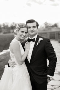 A black and white portrait of a bride and groom on their wedding day at Hamilton Farm Golf Club in New Jersey. Photo by Kelly Kollar Photography.