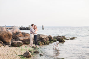 An engaged couple and their lab on Shelter Island. Photo by Kelly Kollar Photography.