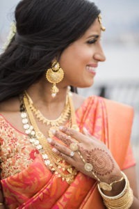 An Indian bride in a sari on her wedding day in New Jersey. Photo by Kelly Kollar Photography.
