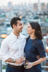 An engagement session on a rooftop in Manhattan. Photo by Kelly Kollar Photography.