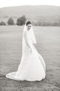 A black and white portrait of a bride on her wedding day at Lion Rock Farm in Connecticut. Photo by Kelly Kollar Photography.