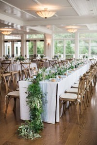 A table scape for a wedding reception at Peconic Bay Yacht Club on the North Fork of Long Island. Photo by Kelly Kollar Photography.