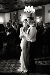 A bride and groom dance at their wedding reception at New York Athletic Club in Manhattan. Photo by Kelly Kollar Photography.