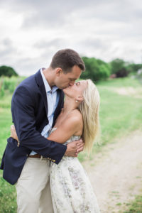 A bride and groom at their rehearsal dinner at Corey Crook Winery on The North Fork of Long Island. Photo by Kelly Kollar Photography.