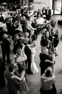 A bride and groom dance during their wedding reception at The Roundhouse Beacon in New York. Photo by Kelly Kollar Photography.