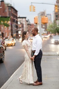An engaged couple walk in the West Village for their engagement photos. Photo by Kelly Kollar Photography.