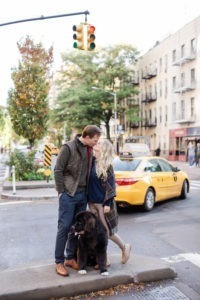 An engaged couple and their Newfoundland dog in The West Village in Manhattan. Photo by Kelly Kollar Photography.